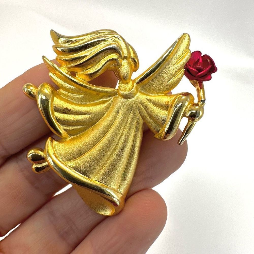 Tara vintage gold tone angel brooch with a rose pin